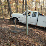A typical monitoring well and AEM's sample truck. A typical monitoring well and AEM's sample truck.