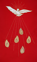 The Holy Spirit symbolised by the Dove and Tongues of Flame