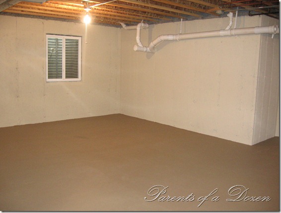 parents of a dozen painting an unfinished basement parents of a dozen painting an unfinished basement