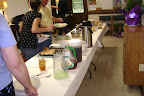 Buffet of crawfish pistolettes, crawfish etoufee, green salad, chicken salad, hot dogs, chips, cake, and jello