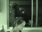 Laura in the window and Kendra playing Sims2, night vision shot