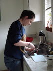 Cleaning her first fish