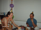 Kendra presents the birthday cake