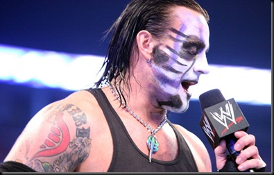 c-m-punk-comes-out-in-the-jeff-hardy-music-and-style-with-his-clothes-of-jeff-hardy-and-colored-face-and-speaking-to-wwe-universe-1