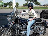 I like the paint job on her bike.