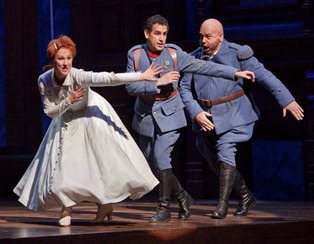 Diana Damrau as Marie, Juan Diego Flórez as Tonio, and Maurizio Muraro as Sulpice in Laurent Pelly's production of LA FILLE DU RÉGIMENT [Photo by Ken Howard]