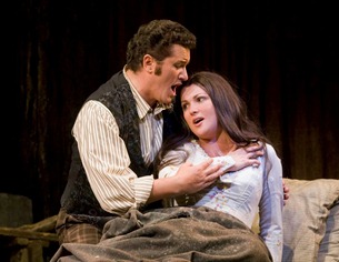 Piotr Beczala as Rodolfo and Anna Netrebko as Mimì in LA BOHÈME [Photo by Corey Weaver]