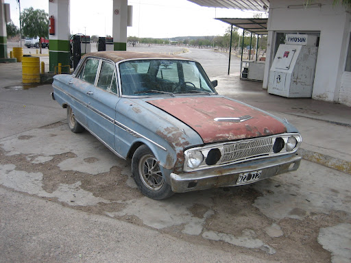 A Ford Falcon that has seen better days but yet still runs just