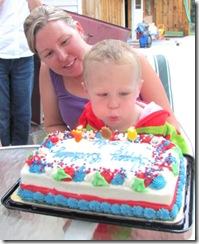 cody 3rd birthday blowing candles