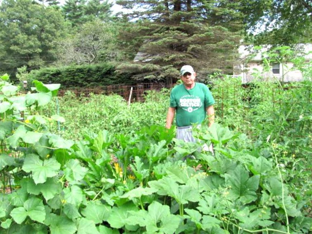 [garden pic with Tom 8.2010[2].jpg]
