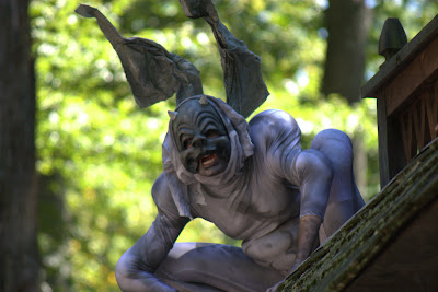 Its Batman, no it is a gargoyle