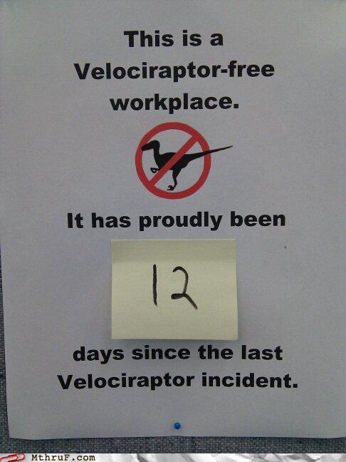 photo of Velociraptor-free workplace sign
