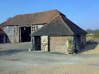 View from the front, the cow shed and the barn