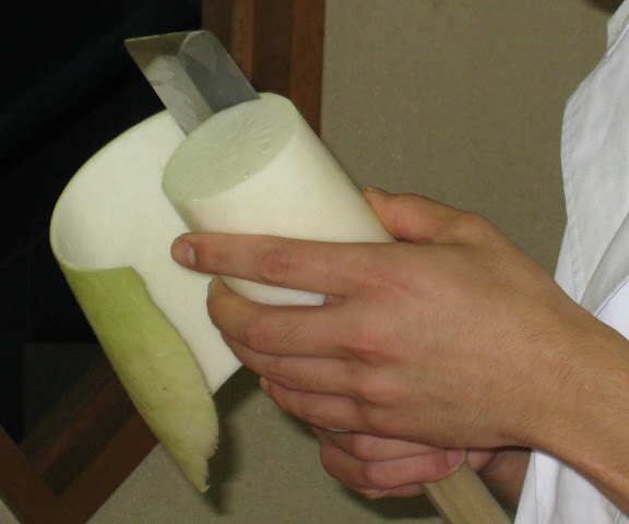 peeling a radish