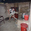 Stoking the fire in an underground kitchen, the smoke then piped out many metres away to hide its true location.