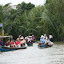 Suddenly we erupt into the mekong, a spew of tourists vomited into the delta.