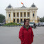 Lynette in front of Hanoi Opera House; if you've ever heard Asian opera you'll understand why we didn't go inside...
