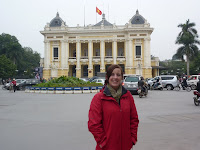 Lynette in front of Hanoi Opera House; if you've ever heard Asian opera you'll understand why we didn't go inside...