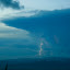 This storm cloud was gathering strength to the right, it came nowhere close but I was pleased to get this shot of lightning, however small!