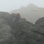 Who now needs a bit of shelter from the freezing cold before attempting the descent!