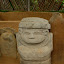 This statue was apparently royalty as he had a necklace on, he also looks very fat