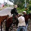 Me getting on my horse, gleeful at first...I soon named him Satan