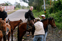 Me getting on my horse, gleeful at first...I soon named him Satan