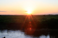 The view of the sunset from the bar, you keep expecting the Big Four to sprint across the view.