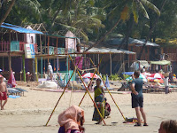 Goa beach, where the more inventive touts bring have a mobile high wire and well trained children.