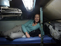 Lynette making herself comfortable on our first Indian train, sleeper class.