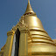Basking in the golden glow of Phra Siratana Chedi.
