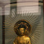 Buddha is always depicted with elongated ears, three wrinkles in his neck (showing wisdom) and a very asexual appearance.