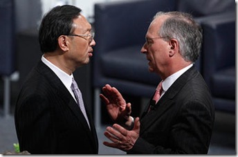 China's Foreign Minister Yang Jiechi is welcomed by Wolfgang Ischinger, chairman of the Conference on Security Friday before the start of the 46th Conference on Security Policy in Munich. Speaking with uncharacteristic bluntness, Mr. Yang accused the US of violating international law with its proposed arms sale to Taiwan.