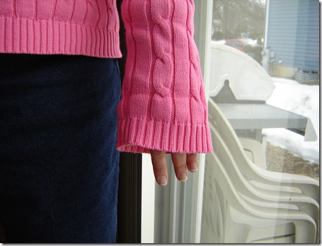 sweater with hands on it