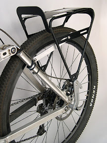 Cold Springs Rear – Load Limit: 22kg – $250 The Cold Springs Rear is our toughest no-eyelet compatible rack. It’s laser-cut top plate is a single piece of 6061-T6 Aluminum that is folded at the rear for a unique look and added strength. This is OMM’s original model, first designed in 1996.