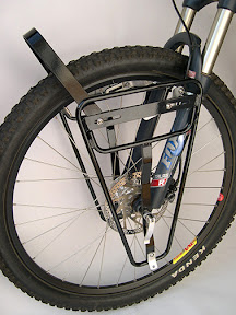 Ultimate Low Rider (Right) – Load Limit 18kg – $160 The Ultimate LowRider gives you all the benefits of our axle and brake-bolt mounting system, with the increased handling of a low-mount rack. You can choose from an upper and lower mounting point for your panniers, which have generous surface coverage from the Ultimate’s ample size.