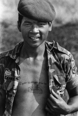 01 Mar 1973, Vietnam --- Tattooed Vietnamese Soldier --- Image by