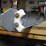 Another view of the rudder stop from the bottom, looking up.  In the background you can see the front spar of the rudder and the three extra rivets I added to account for the minimum edge distance after the front spar was shortened by 5/8“, per the plans.