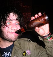 Stupid-looking guy drinking beer