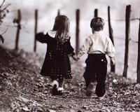 Little boy and girl hold hands