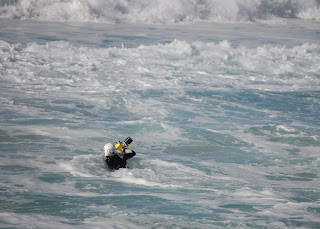 surfing with a camera, shouldn't be too hard