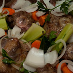 After browning the meat the braising liquids and veggies get added