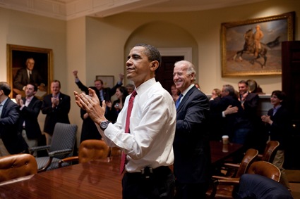 President Barack Obama, Vice President Joe Biden, and senior staff applaud in the Roosevelt Room of the White House, as the House passes the health care reform bill, March 21, 2010. (Official White House Photo by Pete Souza)

This official White House photograph is being made available only for publication by news organizations and/or for personal use printing by the subject(s) of the photograph. The photograph may not be manipulated in any way and may not be used in commercial or political materials, advertisements, emails, products, promotions that in any way suggests approval or endorsement of the President, the First Family, or the White House. 