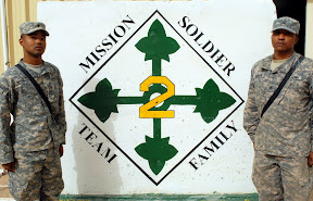 Sgt. Larry L. Robinson (right) and Spc. Craig Stokes, both military intelligence analysts in A Company, 2nd Special Troops Battalion, 2nd Brigade Combat Team, 4th Infantry Division, competed in and won the brigade’s Noncommissioned Officer and Soldier of the Quarter board June 6.