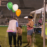 Handing out some balloons to a kid