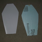 Thigh armor - polystyrene sheet to cover a foam sheet.  The grooves in the foam let me curve it along its length.