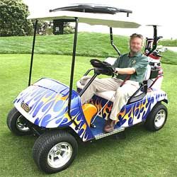 golf cart in purple coleor with nice flames on the side of it