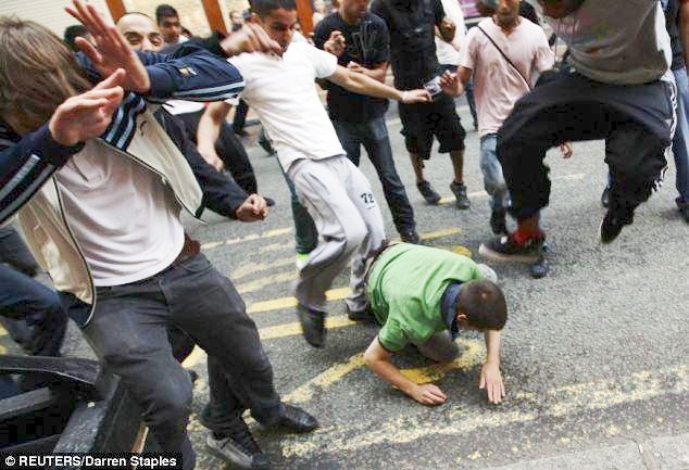 [peaceful protester kicked repeatedly[4].jpg]
