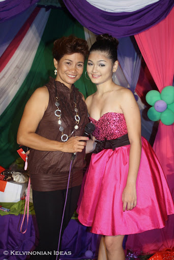 Ping Polintan, the mother of the debutante (Beside her)