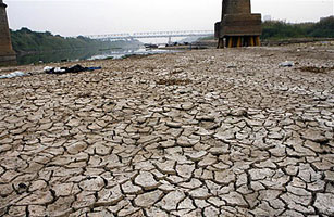 The dried-up bed of the Red River, near Long Bien Bridge in Hanoi on Dec. 1, 2009. Nguyen Huy Kham / Reuters